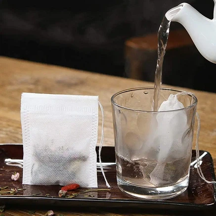 Non Woven teposer med snøre